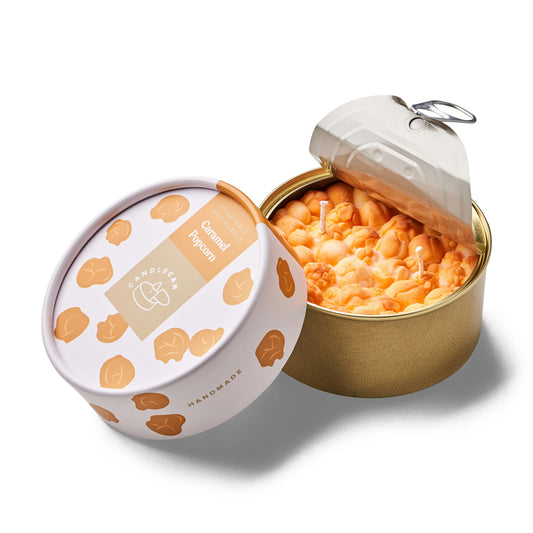 caramel popcorn scented candle in a can