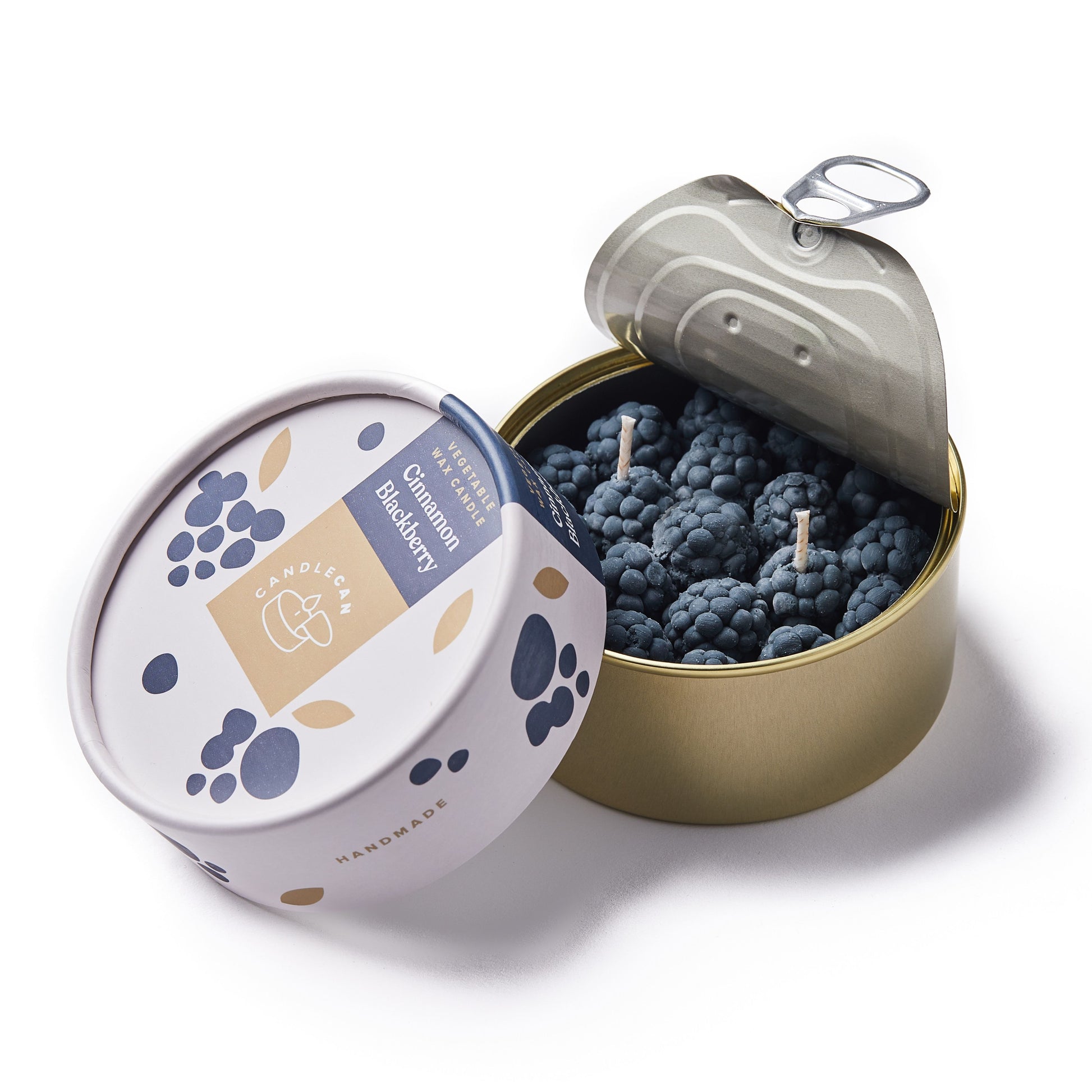 cinnamon blackberry shaped scented candle in a gold tin 