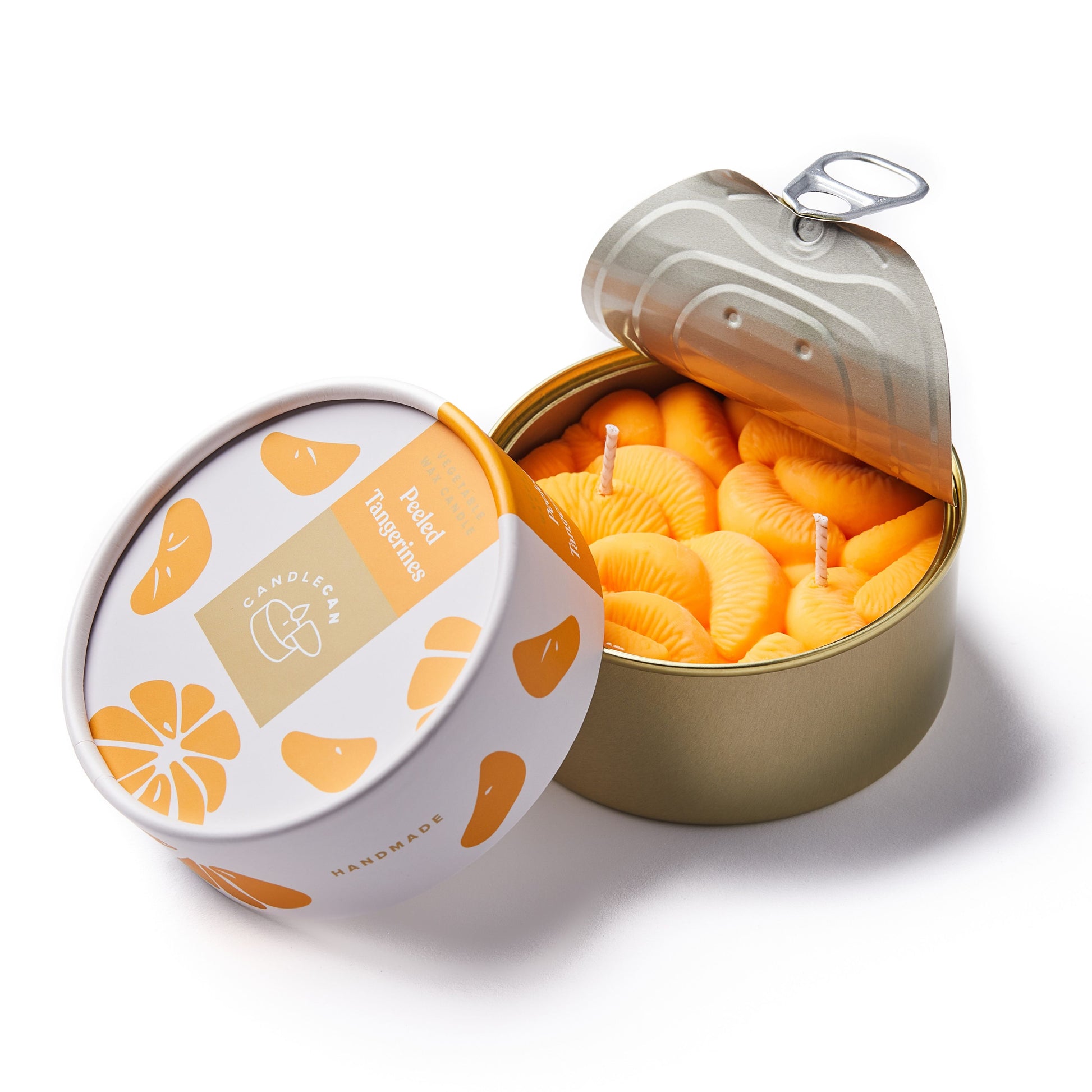 peeled tangerines shaped food candle in a gold tin 