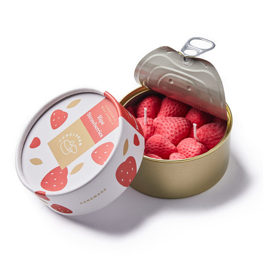 strawberry shaped scented candle in a can 