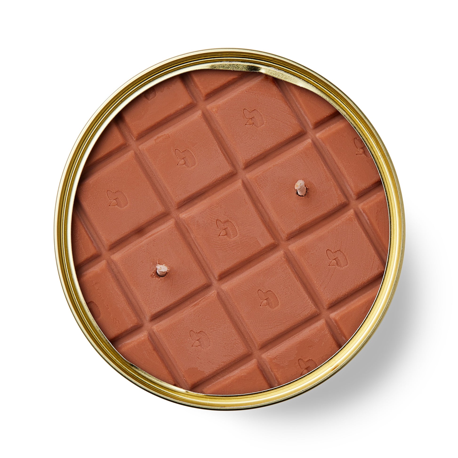 chocolate shaped candle in a gold tin on a white background
